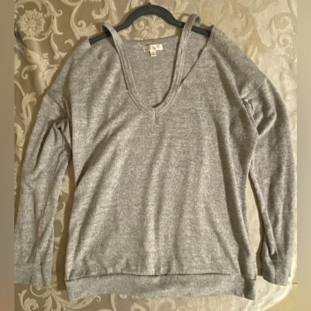 Medium gray sweatshirt with shoulder cut-outs